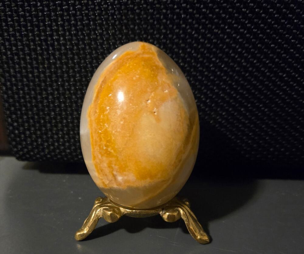 Polished egg made from Carnelian Agate or Orange Calcite